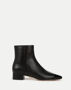 Cecile Leather Cap-Toe Bootie in Black/Black