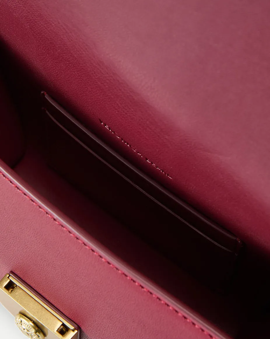 Small Crest Lock Trap Bag in Burgundy